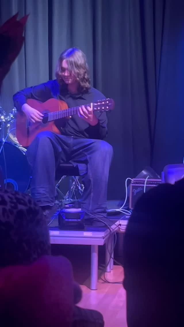 Guitar student learning chords at Lowestoft studio